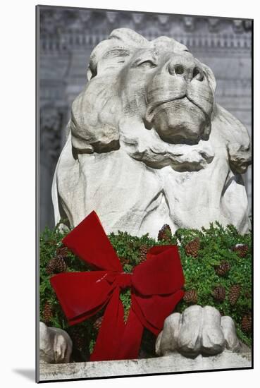 New York Public Library Lion Decorated with a Christmas Wreath during the Holidays.-Jon Hicks-Mounted Photographic Print