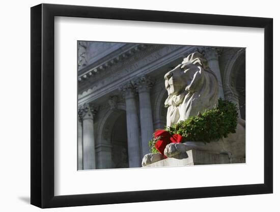 New York Public Library Lion Decorated with a Christmas Wreath during the Holidays.-Jon Hicks-Framed Photographic Print