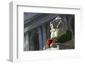 New York Public Library Lion Decorated with a Christmas Wreath during the Holidays.-Jon Hicks-Framed Photographic Print