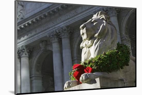 New York Public Library Lion Decorated with a Christmas Wreath during the Holidays.-Jon Hicks-Mounted Photographic Print