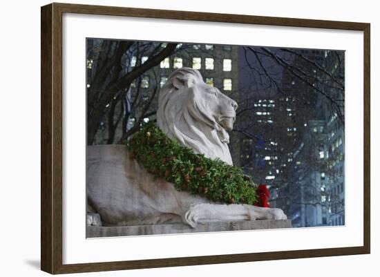 New York Public Library Lion Decorated with a Christmas Wreath during the Holidays.-Jon Hicks-Framed Photographic Print