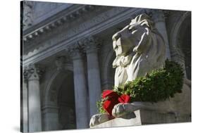 New York Public Library Lion Decorated with a Christmas Wreath during the Holidays.-Jon Hicks-Stretched Canvas