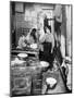 New York Tenement Apartment with a Mother and Her Two Children, 1910-null-Mounted Photo