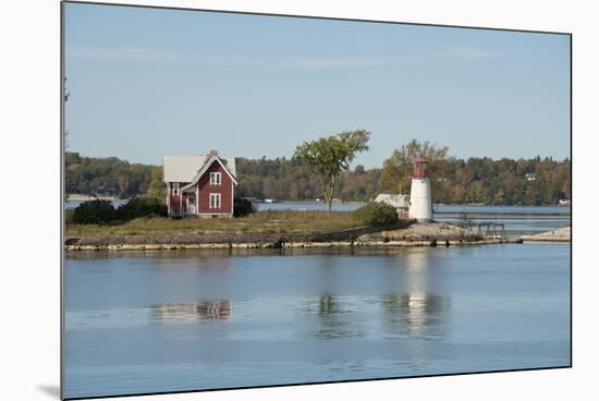 New York, Thousand Islands. Home with lighthouse on tiny island.-Cindy Miller Hopkins-Mounted Photographic Print