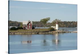 New York, Thousand Islands. Home with lighthouse on tiny island.-Cindy Miller Hopkins-Stretched Canvas