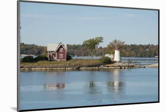 New York, Thousand Islands. Home with lighthouse on tiny island.-Cindy Miller Hopkins-Mounted Photographic Print