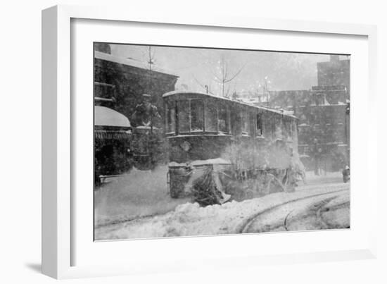 New York Trolley Car Makes its Way During the Blizzard of 1922-null-Framed Art Print