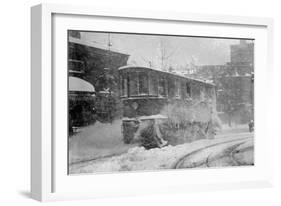 New York Trolley Car Makes its Way During the Blizzard of 1922-null-Framed Art Print