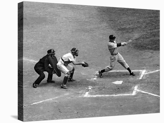 New York Yankee Joe Di Maggio Swinging Bat in Game Against the Philadelphia Athletics-Alfred Eisenstaedt-Stretched Canvas