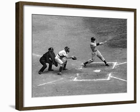 New York Yankee Joe Di Maggio Swinging Bat in Game Against the Philadelphia Athletics-Alfred Eisenstaedt-Framed Premium Photographic Print