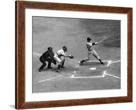 New York Yankee Joe Di Maggio Swinging Bat in Game Against the Philadelphia Athletics-Alfred Eisenstaedt-Framed Premium Photographic Print