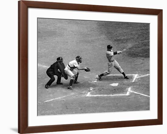 New York Yankee Joe Di Maggio Swinging Bat in Game Against the Philadelphia Athletics-Alfred Eisenstaedt-Framed Premium Photographic Print