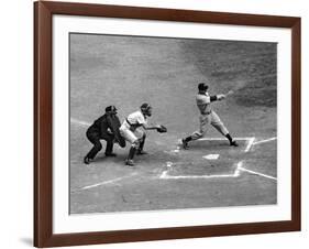 New York Yankee Joe Di Maggio Swinging Bat in Game Against the Philadelphia Athletics-Alfred Eisenstaedt-Framed Premium Photographic Print