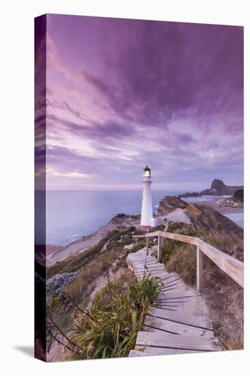 New Zealand, North Island, Castlepoint. Castlepoint Lighthouse-Walter Bibikow-Stretched Canvas