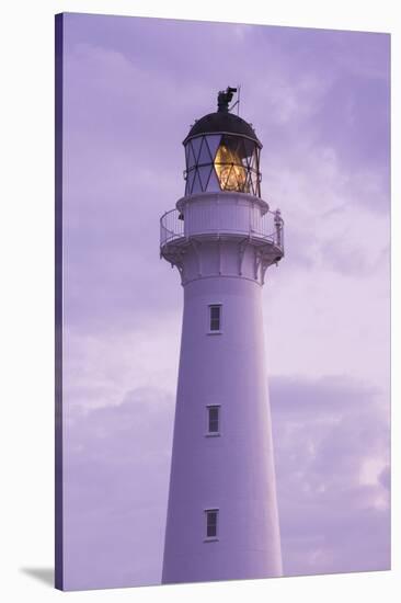 New Zealand, North Island, Castlepoint. Castlepoint Lighthouse-Walter Bibikow-Stretched Canvas