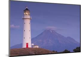 New Zealand, North Island, Pungarehu. Cape Egmont Lighthouse and Mt. Taranaki-Walter Bibikow-Mounted Photographic Print