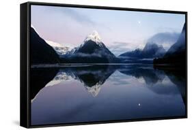 New Zealand, Nuova Zelanda, Fiordland, Milford Sound and Moon During a Cold and Misty Sunrise.-Andrea Pozzi-Framed Stretched Canvas