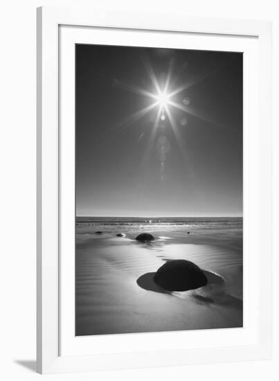 New Zealand, South Island. BW starburst over Moeraki Boulders Scenic Reserve.-Jaynes Gallery-Framed Photographic Print