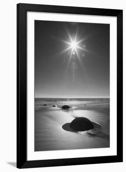 New Zealand, South Island. BW starburst over Moeraki Boulders Scenic Reserve.-Jaynes Gallery-Framed Photographic Print