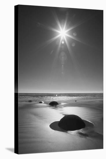 New Zealand, South Island. BW starburst over Moeraki Boulders Scenic Reserve.-Jaynes Gallery-Stretched Canvas