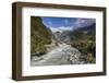 New Zealand, South Island, Fox Glacier Village, Fox Glacier hikers along Fox River-Walter Bibikow-Framed Photographic Print