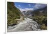 New Zealand, South Island, Fox Glacier Village, Fox Glacier hikers along Fox River-Walter Bibikow-Framed Photographic Print