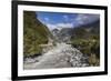 New Zealand, South Island, Fox Glacier Village, Fox Glacier hikers along Fox River-Walter Bibikow-Framed Premium Photographic Print