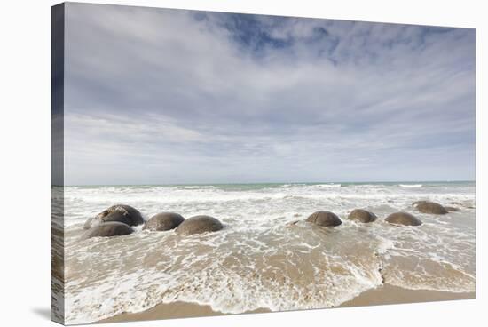 New Zealand, South Island, Otago, Moeraki, Moeraki Boulders-Walter Bibikow-Stretched Canvas