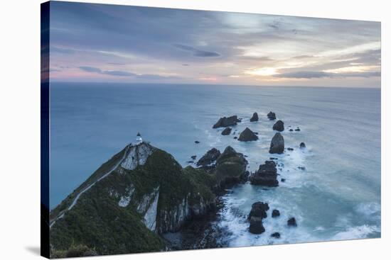 New Zealand, South Island, The Catlins, Nugget Point Lighthouse, dawn-Walter Bibikow-Stretched Canvas