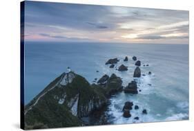 New Zealand, South Island, The Catlins, Nugget Point Lighthouse, dawn-Walter Bibikow-Stretched Canvas
