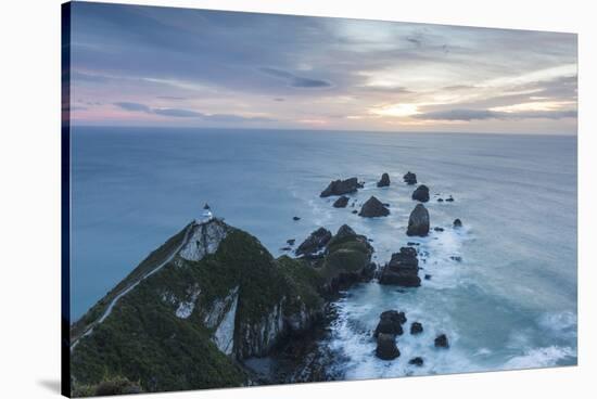 New Zealand, South Island, The Catlins, Nugget Point Lighthouse, dawn-Walter Bibikow-Stretched Canvas