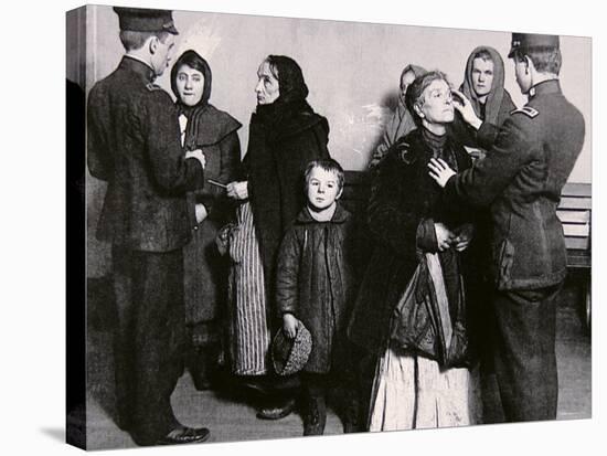 Newly Arrived Immigrants Undergoing Medical Examination on Ellis Island, New York, c.1910-null-Stretched Canvas
