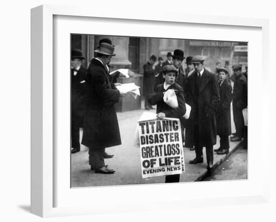 Newsboy Ned Parfett Announcing the Sinking of the 'Titanic' Outside the Offices of the White Star…-null-Framed Photographic Print