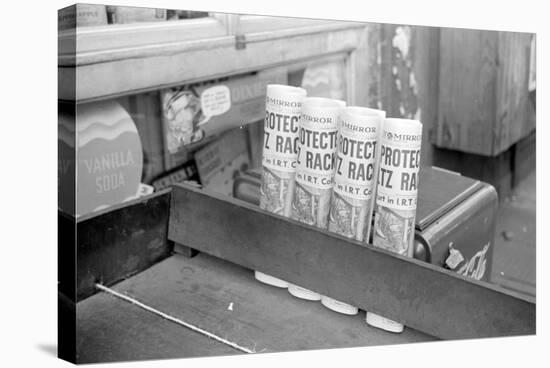 Newspapers for sale at a grocery, 324 East 61st Street, New York City, 1938-Walker Evans-Stretched Canvas