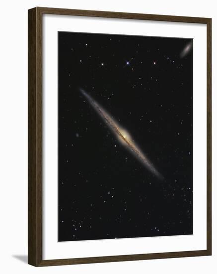 NGC 4565 is an Edge-On Barred Spiral Galaxy in the Constellation Coma Berenices-Stocktrek Images-Framed Photographic Print