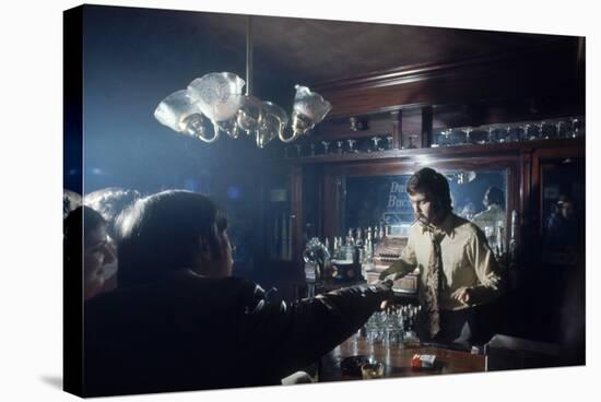 Nhl Boston Bruin Player Derek Sanderson Bartending at His Favorite Boston Bar, 1971-Art Rickerby-Stretched Canvas