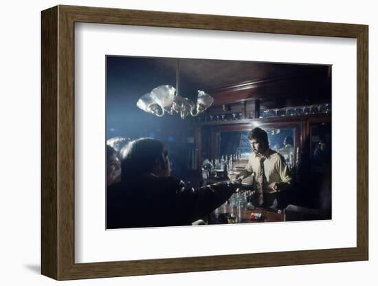 Nhl Boston Bruin Player Derek Sanderson Bartending at His Favorite Boston Bar, 1971-Art Rickerby-Framed Photographic Print