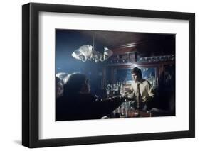 Nhl Boston Bruin Player Derek Sanderson Bartending at His Favorite Boston Bar, 1971-Art Rickerby-Framed Photographic Print