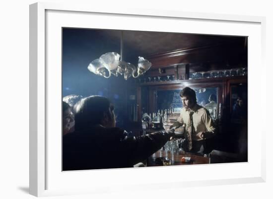 Nhl Boston Bruin Player Derek Sanderson Bartending at His Favorite Boston Bar, 1971-Art Rickerby-Framed Photographic Print