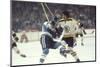 Nhl Boston Bruin Player Derek Sanderson Tripping Pittsburgh Penguin Player During Game-Art Rickerby-Mounted Premium Photographic Print