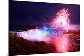 Niagara Falls Lit at Night by Colorful Lights with Fireworks-Songquan Deng-Mounted Photographic Print