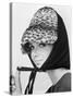 Nicole de la Marge in an Otto Lucas Jersey Scarf over an Ocelot Hat, 1964-John French-Stretched Canvas