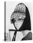 Nicole de la Marge in an Otto Lucas Jersey Scarf over an Ocelot Hat, 1964-John French-Stretched Canvas
