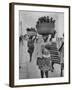 Nigerian Women with Babies Strapped to Their Backs Carrying Large Baskets on Their Heads-Alfred Eisenstaedt-Framed Photographic Print