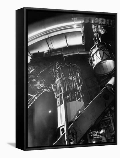 Night Assistant Climbing Down Side of 100-Inch Telescope at Mount Wilson Observatory-Margaret Bourke-White-Framed Stretched Canvas