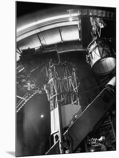 Night Assistant Climbing Down Side of 100-Inch Telescope at Mount Wilson Observatory-Margaret Bourke-White-Mounted Photographic Print