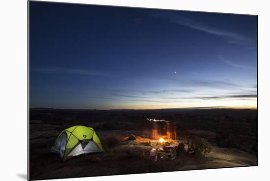 Night Camping Scene with Lit Up Tent and Campfire. Moab, Utah-Matt Jones-Mounted Photographic Print