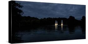 Night Photography Lake with Illuminated Water Fountains-Benjamin Engler-Stretched Canvas