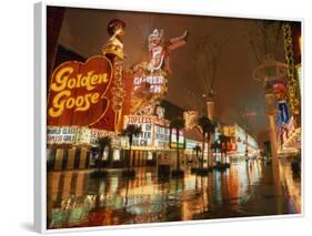 Night Reflections on Wet Street of Neon Signs Along Fremont Street in Las Vegas, Nevada, USA-null-Framed Photographic Print