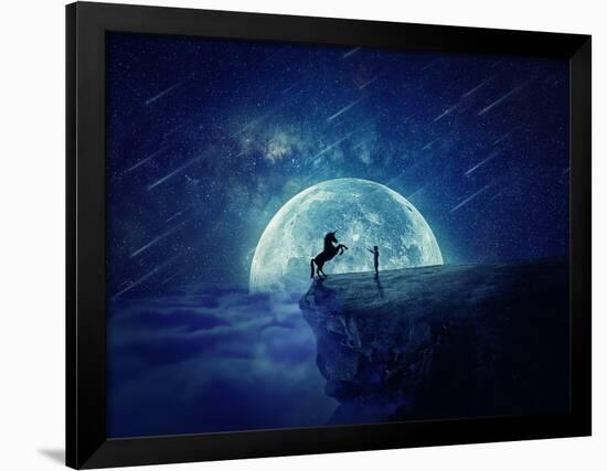 Night Scene with Boy Standing at Edge of Cliff Chasm Trying to Tame Wild Unicorn-Bordeianu Andrei-Framed Photographic Print